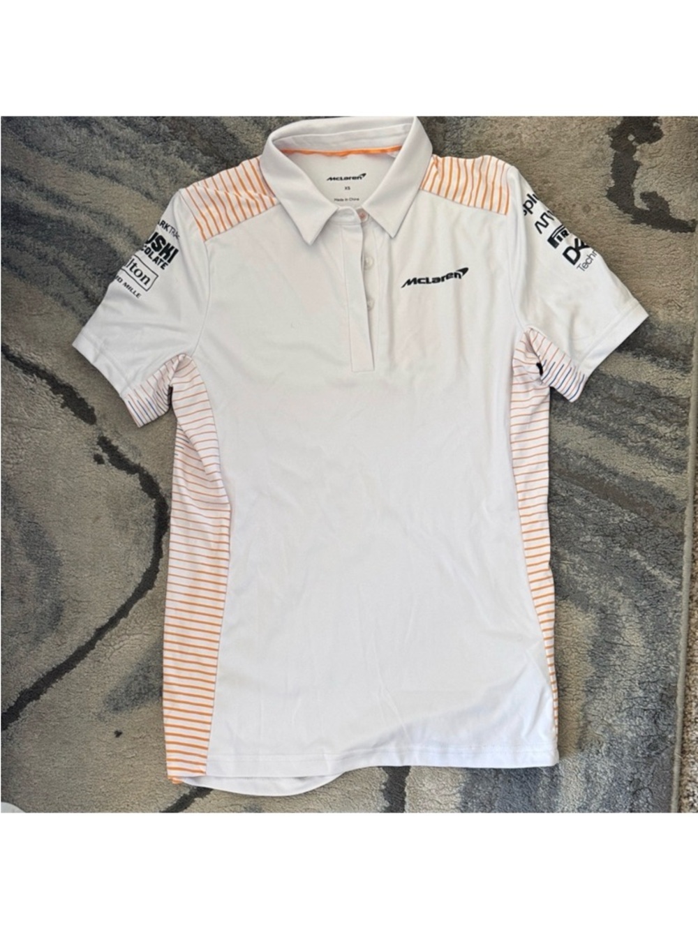 McLaren Women’s White & Light Orange Polo Tee - Short Sleeve